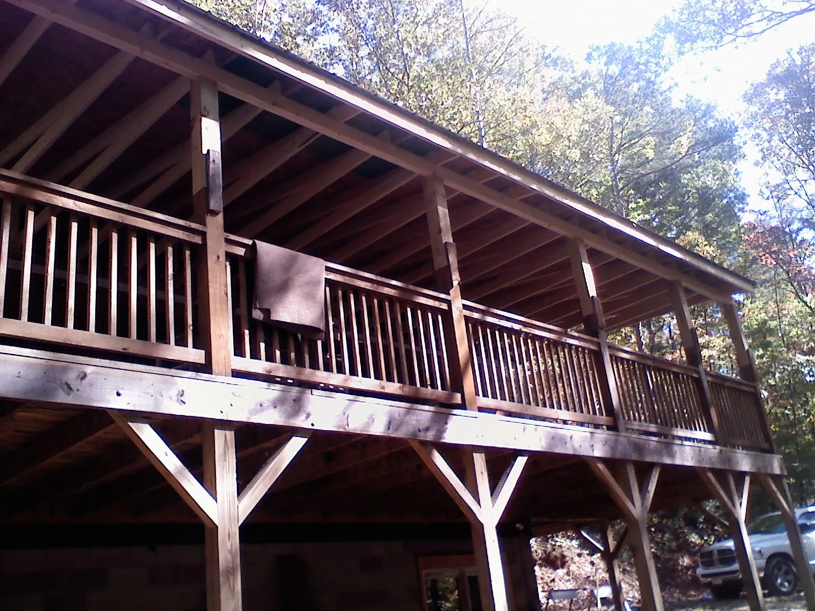 Timber framing under a new elevated porch and deck — Roof Leak Repair in Tully by Roofing Brothers